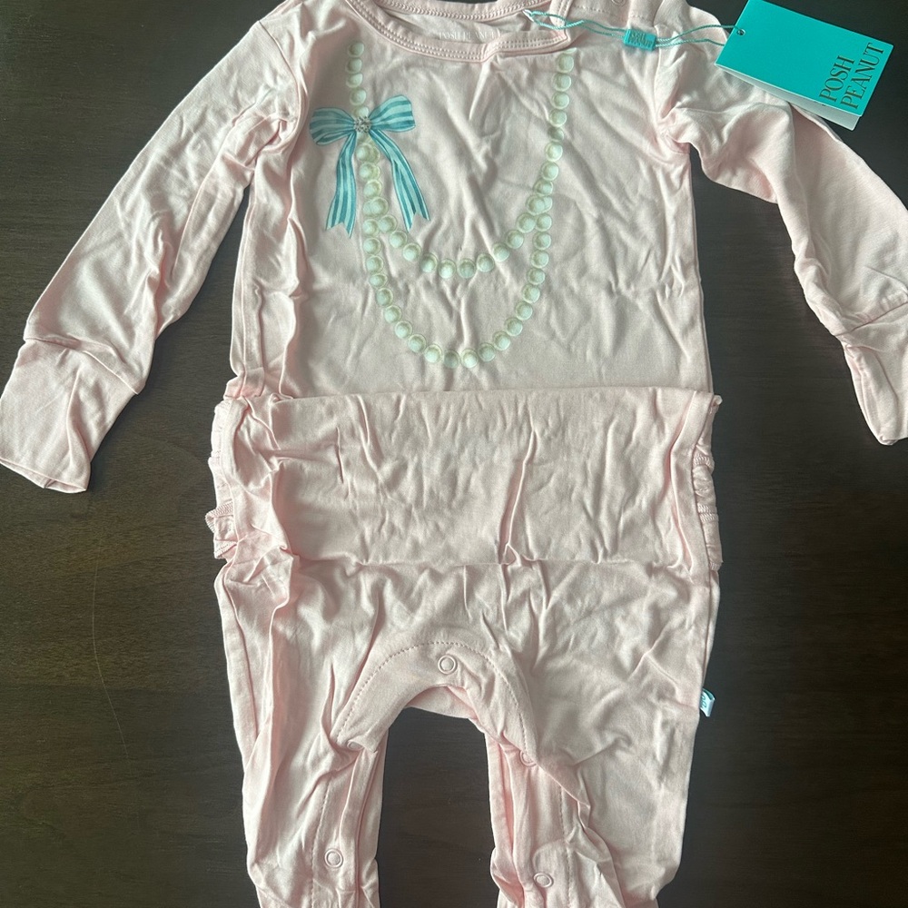 Posh Peanut Light Pink Ruffled Pearl Print One-Piece with Blue Bow